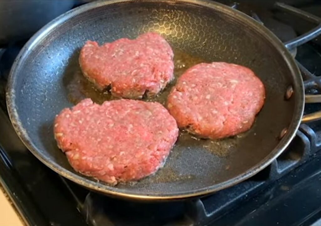 HexClad pan cooking burgers